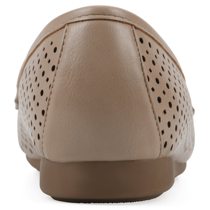 Rear view of a beige perforated loafer shoe 