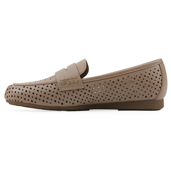 Side view of a beige perforated loafer shoe 