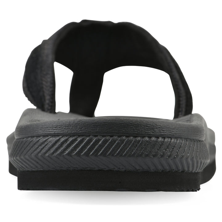 Rear view of a cushioned black fabric thong sandal with black patterned sole