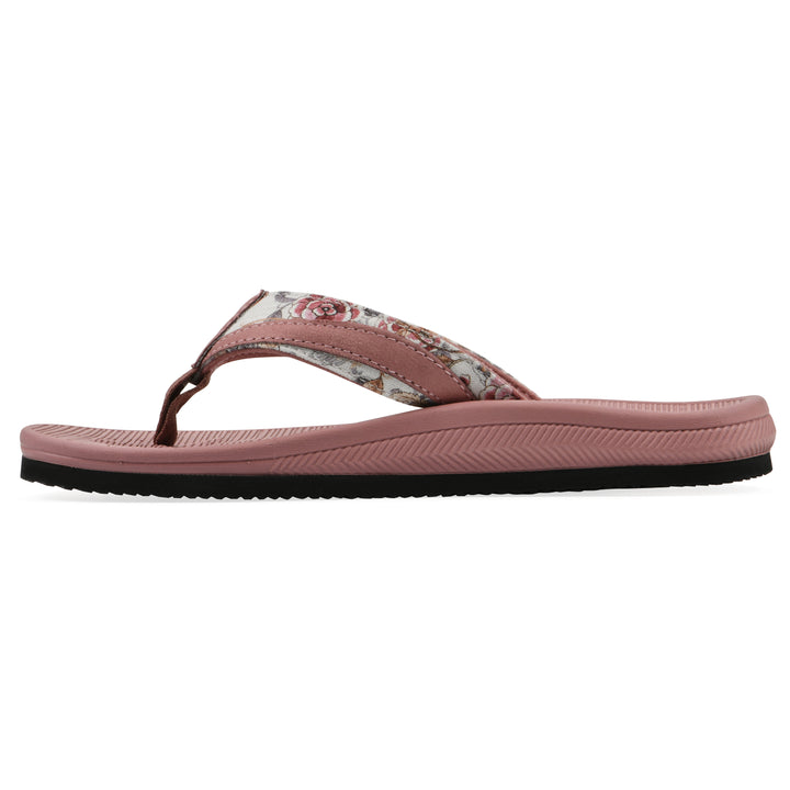 Side view of a cushioned pink floral thong sandal with pink patterned sole