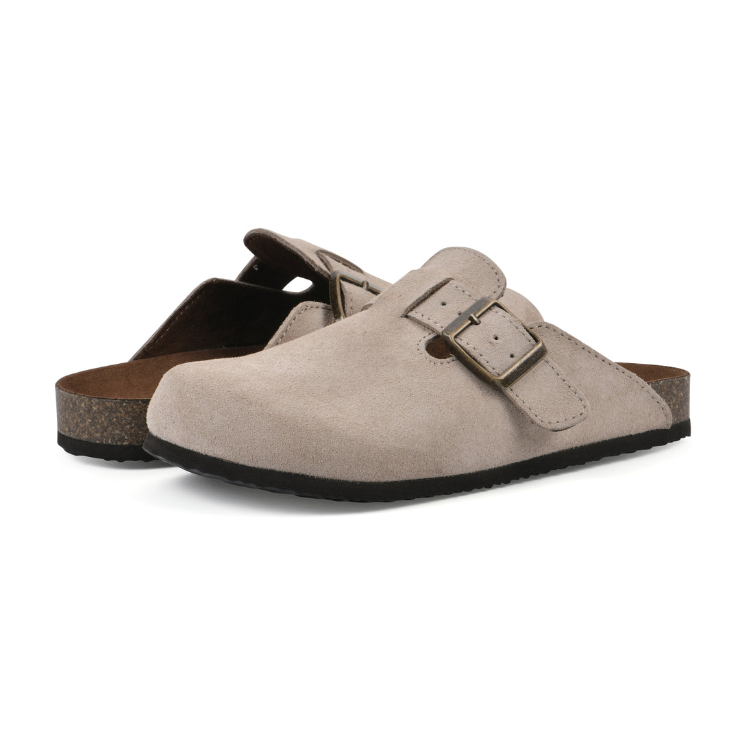 Angle view of a pair of taupe suede children's clogs with metal buckle on an adjustable strap, and a brown sole with black bottom